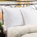 Pure white standard bed pillow core in cotton cover